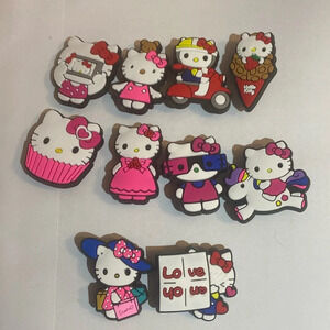Hello Kitty, croc charms total of 10
